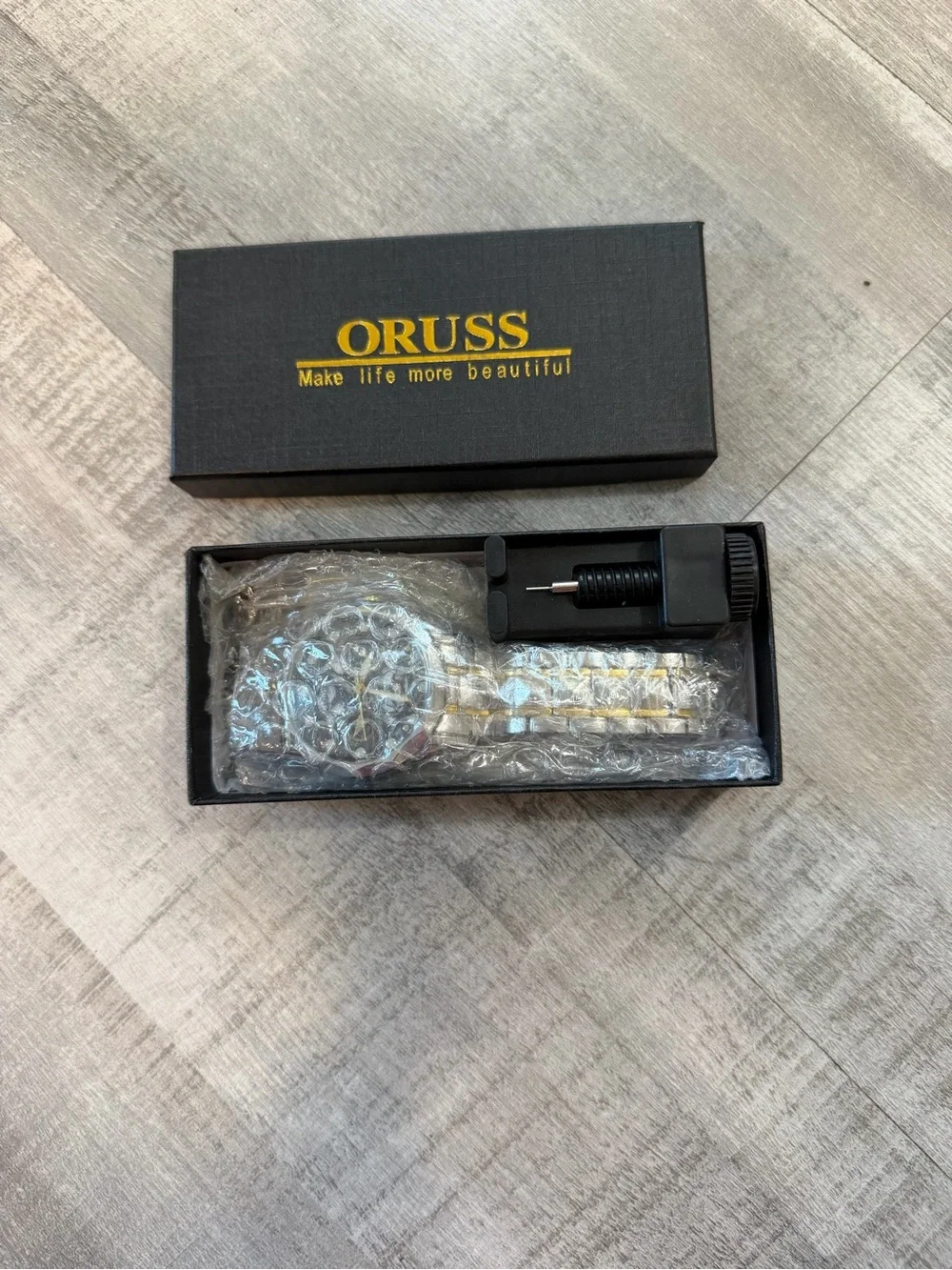 ORUSS Men’s Skeleton Quartz Watch Silver Tone Black Dial Stainless Steel Band